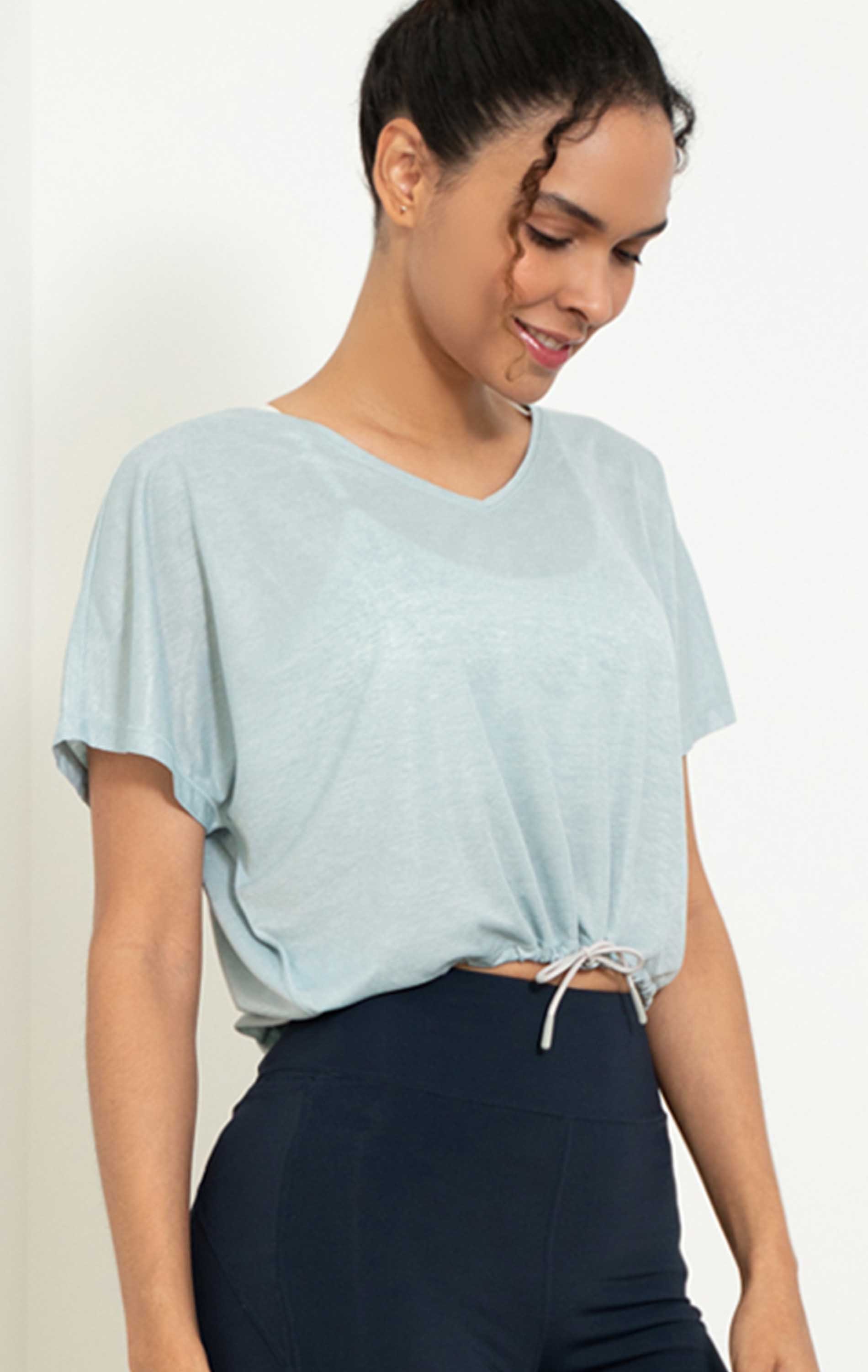 Urban Crop Top featuring adjustable tie strings and V neck design, made from quick-dry polyester fabric.