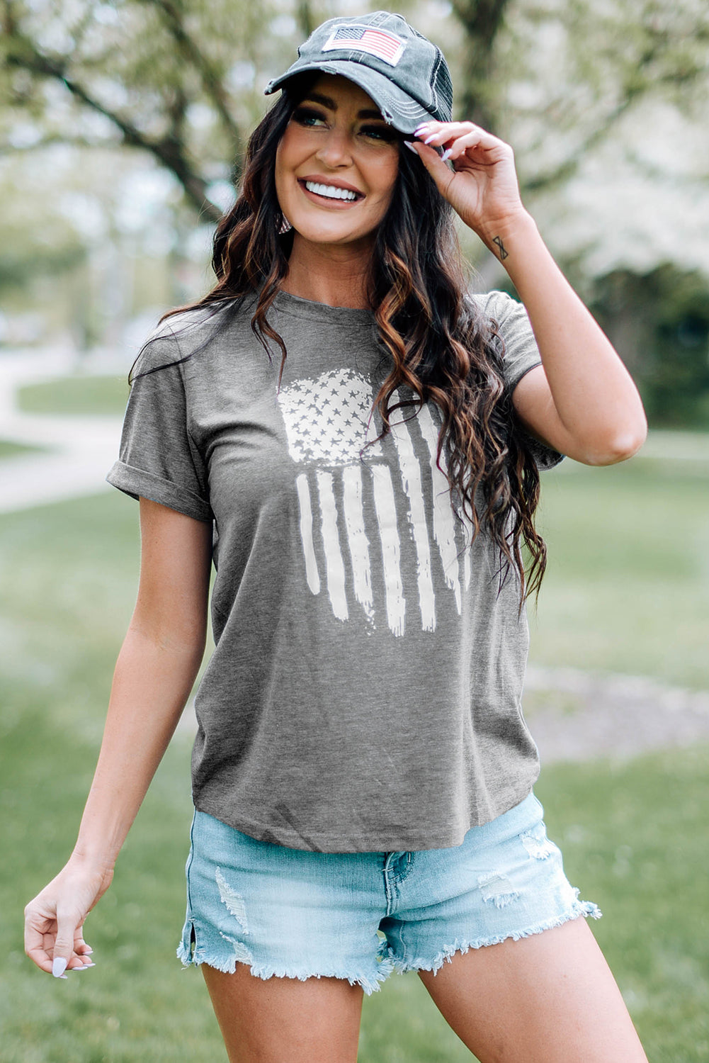 US Flag Graphic Cuffed Sleeve Tee featuring a stylish graphic design, round neck, and short cuffed sleeves, perfect for casual wear.