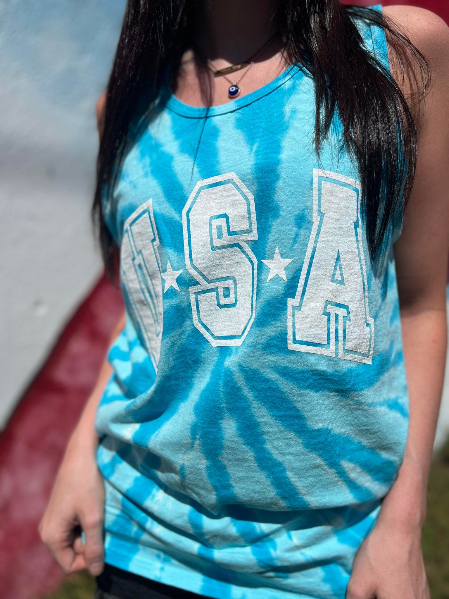 USA Tie Dye Tank top featuring vibrant colors and a unisex design, perfect for casual wear.