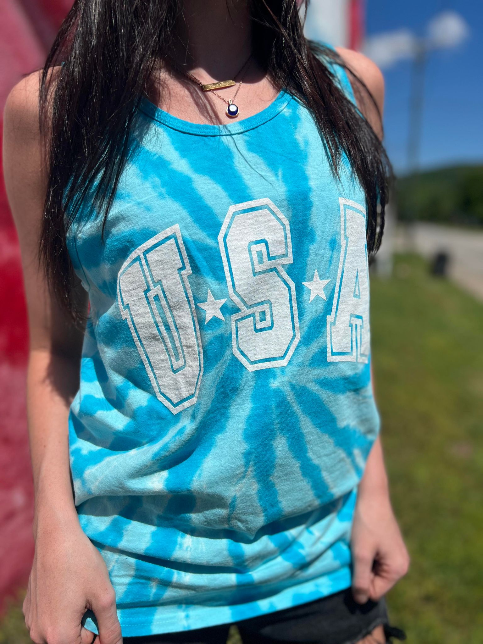 USA Tie Dye Tank top featuring vibrant colors and a unisex design, perfect for casual wear.