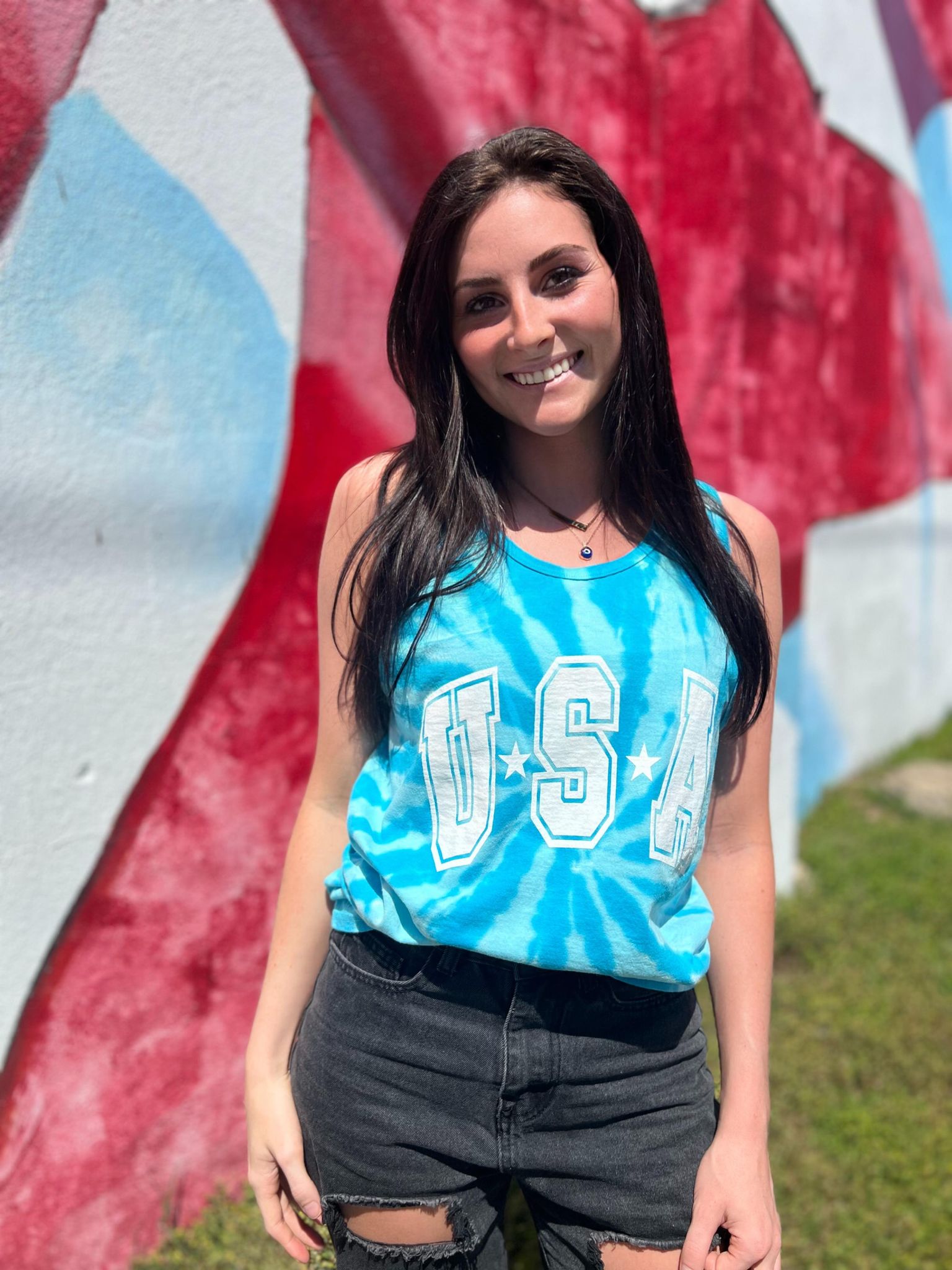 USA Tie Dye Tank top featuring vibrant colors and a unisex design, perfect for casual wear.