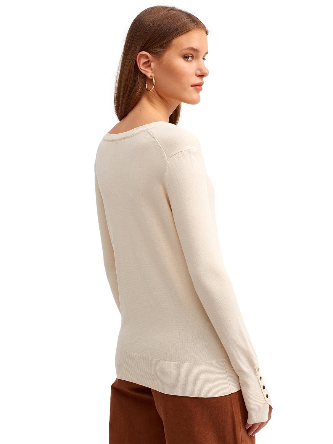 A stylish V Neck Cuff Dropped Sweater in soft fabric, showcasing a modern dropped cuff design and elegant V neckline.