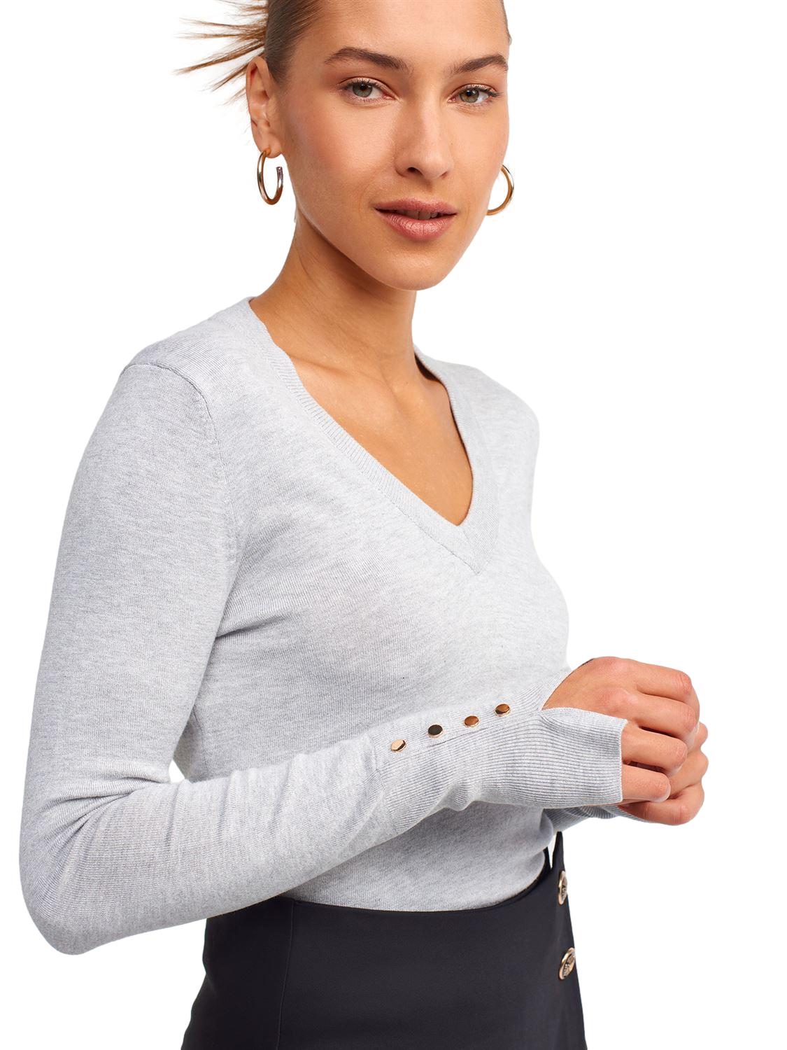 A stylish V Neck Cuff Dropped Sweater in soft fabric, showcasing a modern dropped cuff design and elegant V neckline.