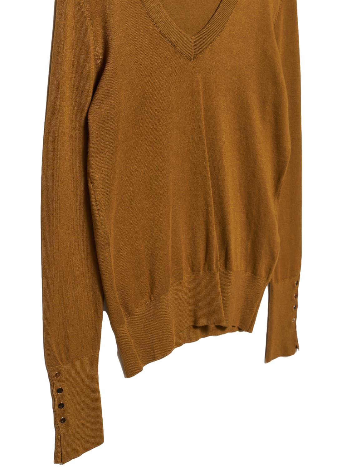 A stylish V Neck Cuff Dropped Sweater in soft fabric, showcasing a modern dropped cuff design and elegant V neckline.