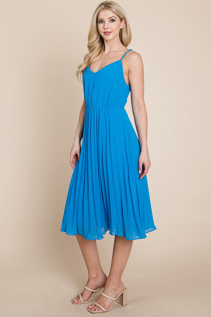 A stylish V Neck Pleated Midi Sundress featuring a sleeveless design, pleated skirt, and adjustable straps, perfect for summer occasions.