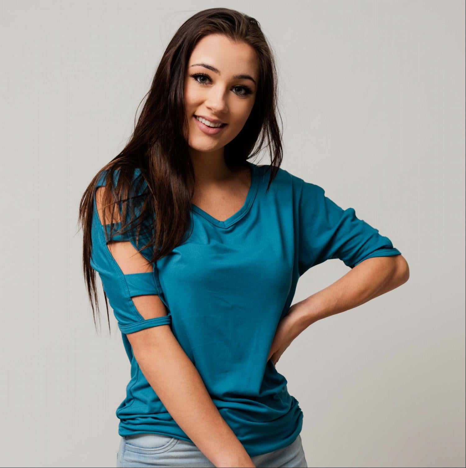 V Neck Short Sleeve Top featuring stylish arm cutouts and a moderate scoop neck, perfect for fall fashion.