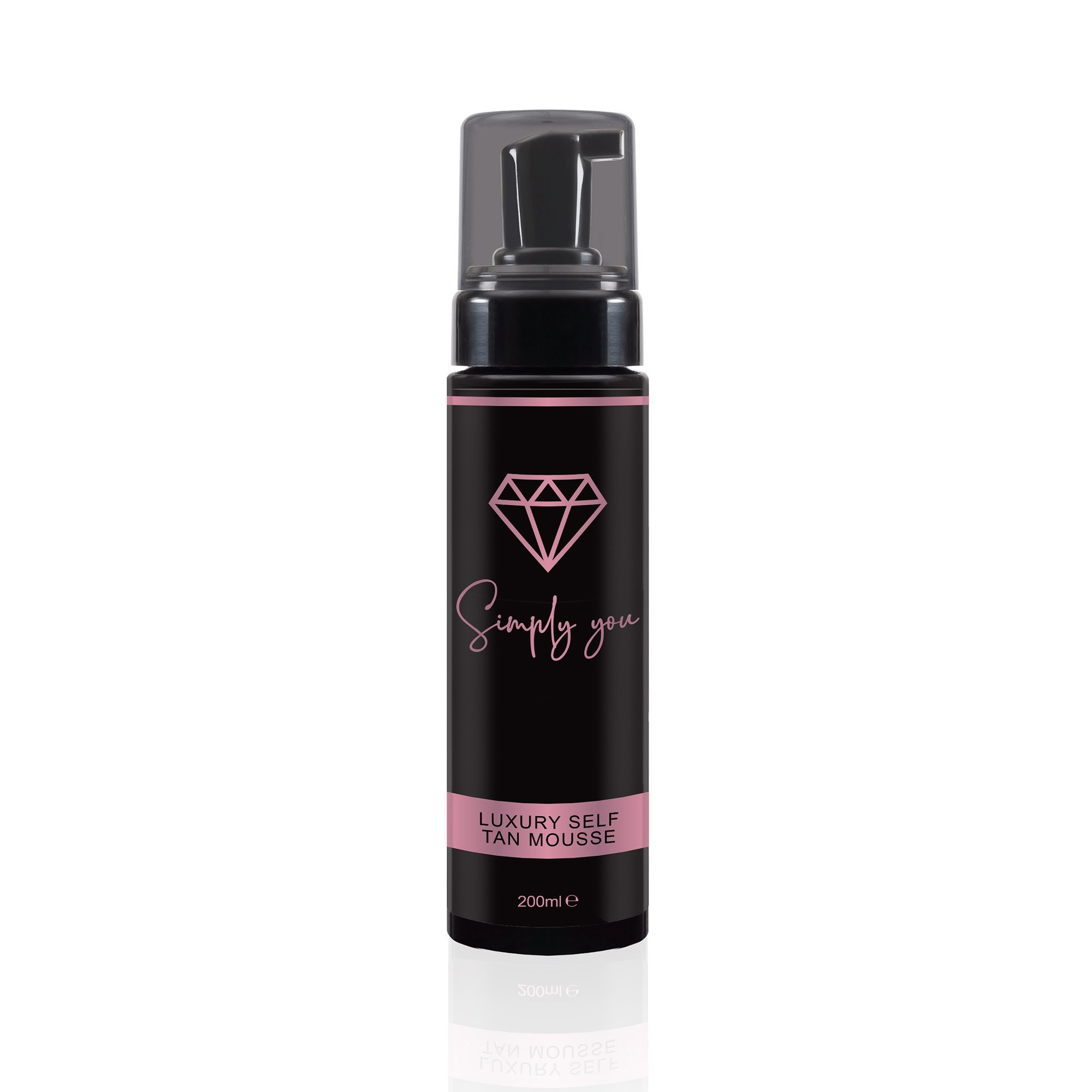 A bottle of Vanilla Tan Mousse with a luxurious design, showcasing its rich texture and vibrant packaging, ideal for achieving a glowing tan.