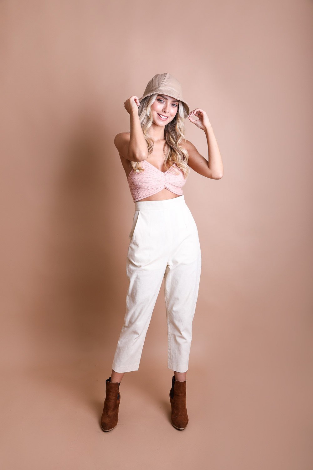 A stylish Vegan Leather Bucket Hat with an adjustable fit, perfect for casual outings and eco-friendly fashion.