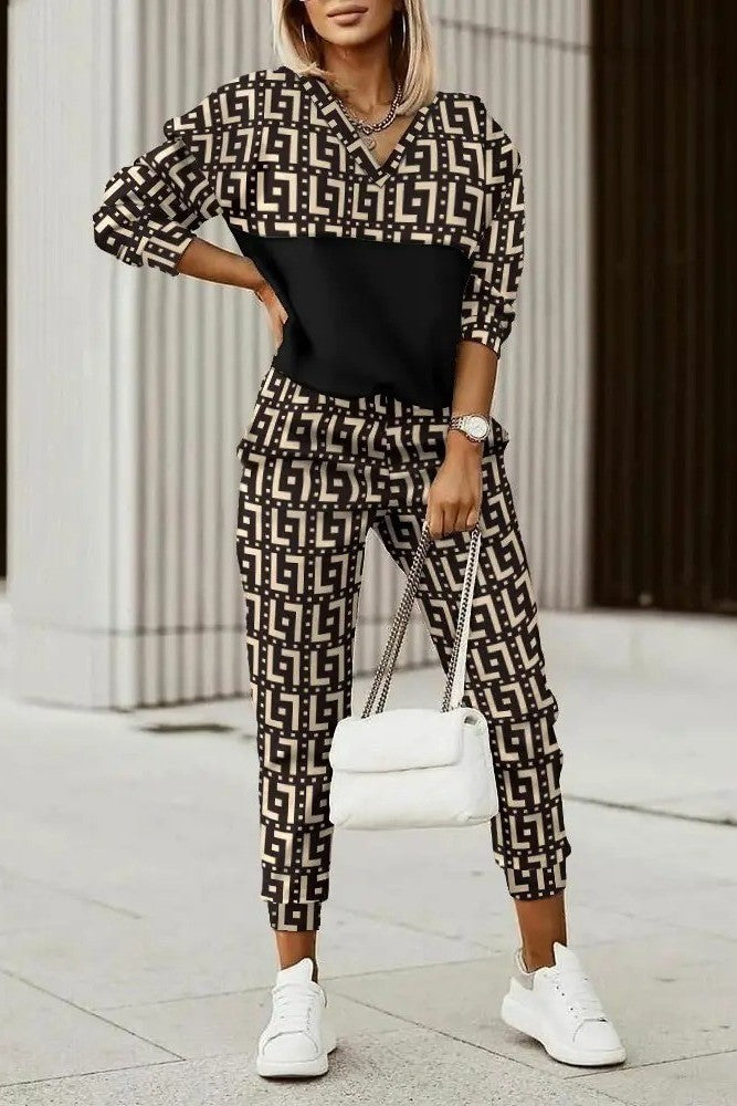 Woman in patterned jumpsuit.