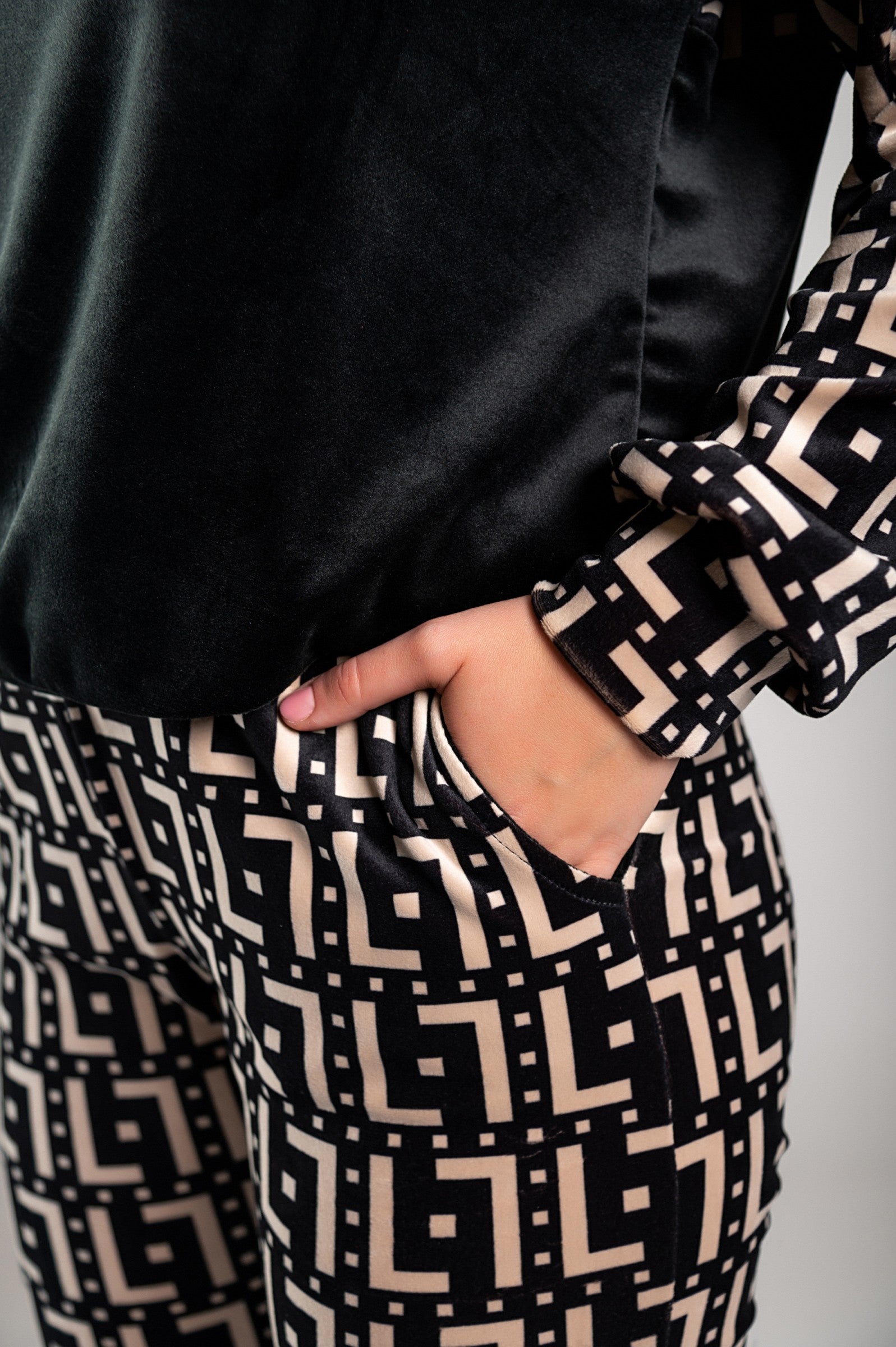 Person wearing geometric patterned clothing