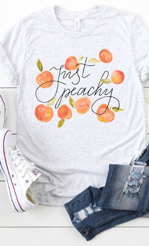 A stylish Vintage Just Peachy Graphic Tee PLUS featuring a retro graphic design in soft fabric, perfect for casual wear.