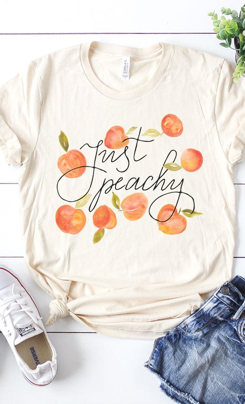 A stylish Vintage Just Peachy Graphic Tee PLUS featuring a retro graphic design in soft fabric, perfect for casual wear.