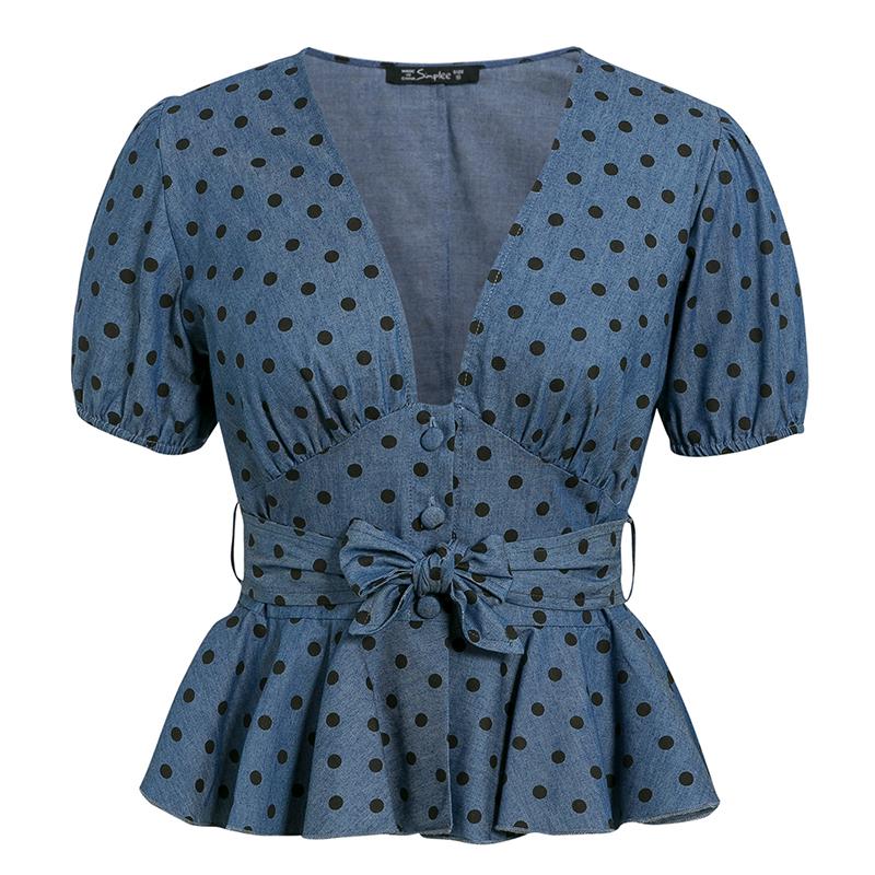 A stylish vintage v neck blouse featuring a polka dot pattern, short puff sleeves, and a casual design, perfect for summer wear.