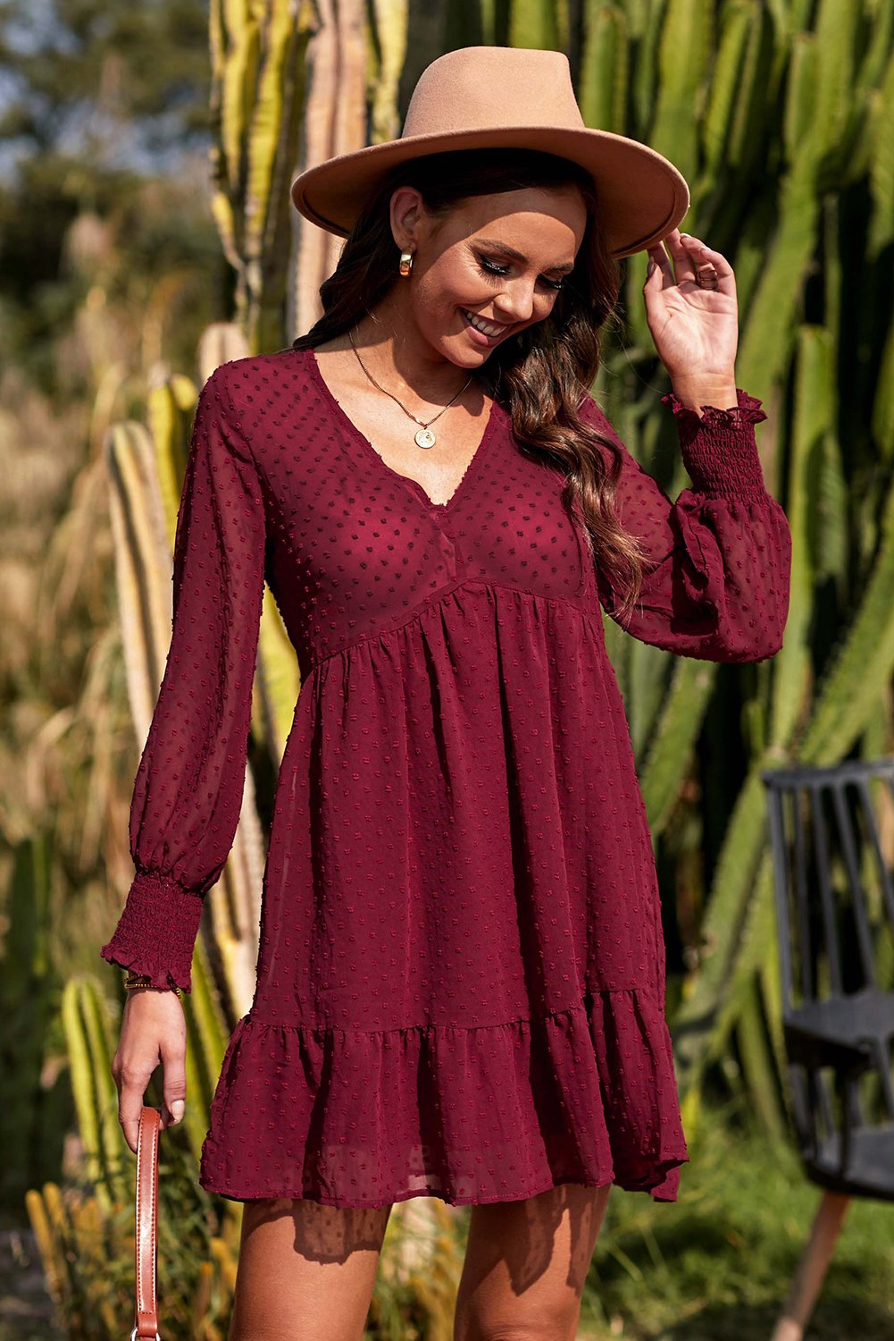 Elegant V-Neck Dotted Burgundy Empire Dress with frilled cuffs and ruffled hemline, showcasing a boho style.