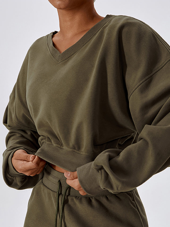 V-Neck Dropped Shoulder Sports Sweatshirt in solid color, showcasing its sporty design and comfortable fit.