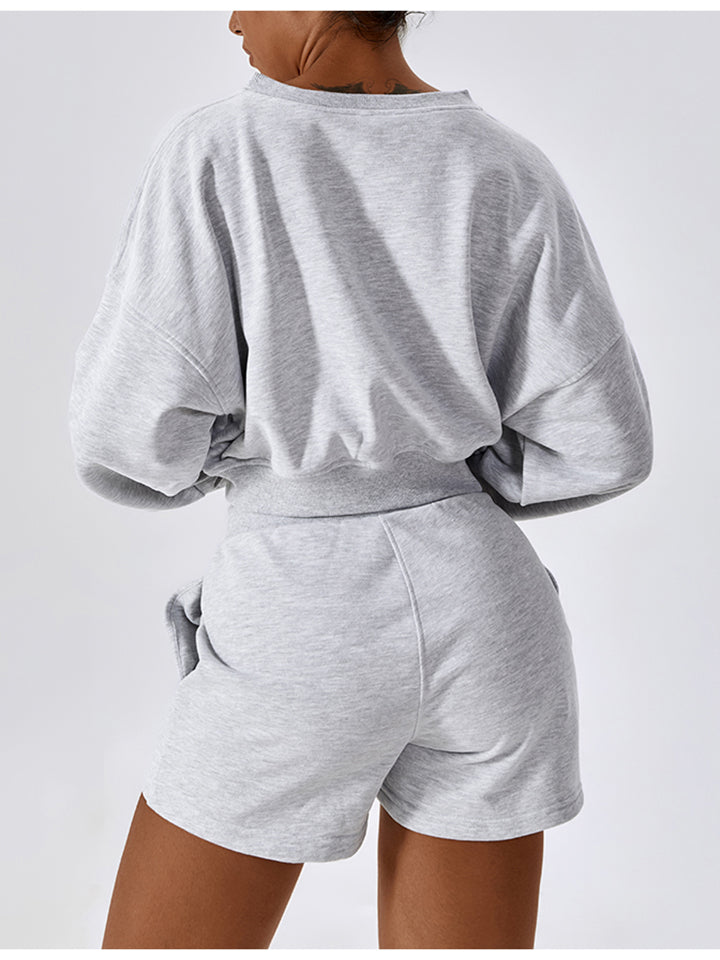 V-Neck Dropped Shoulder Sports Sweatshirt in solid color, showcasing its sporty design and comfortable fit.