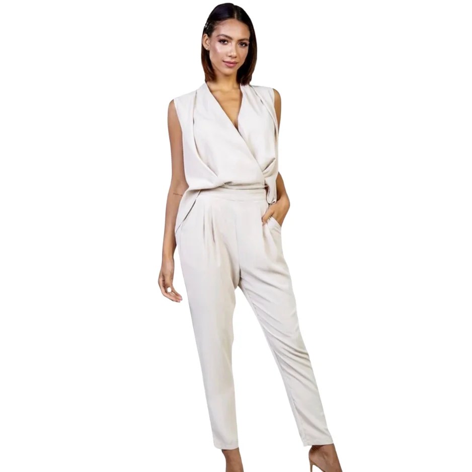 A stylish V-Neck Jumpsuit featuring a flattering mid-section fit, short sleeves, and hand pockets, perfect for parties and events.