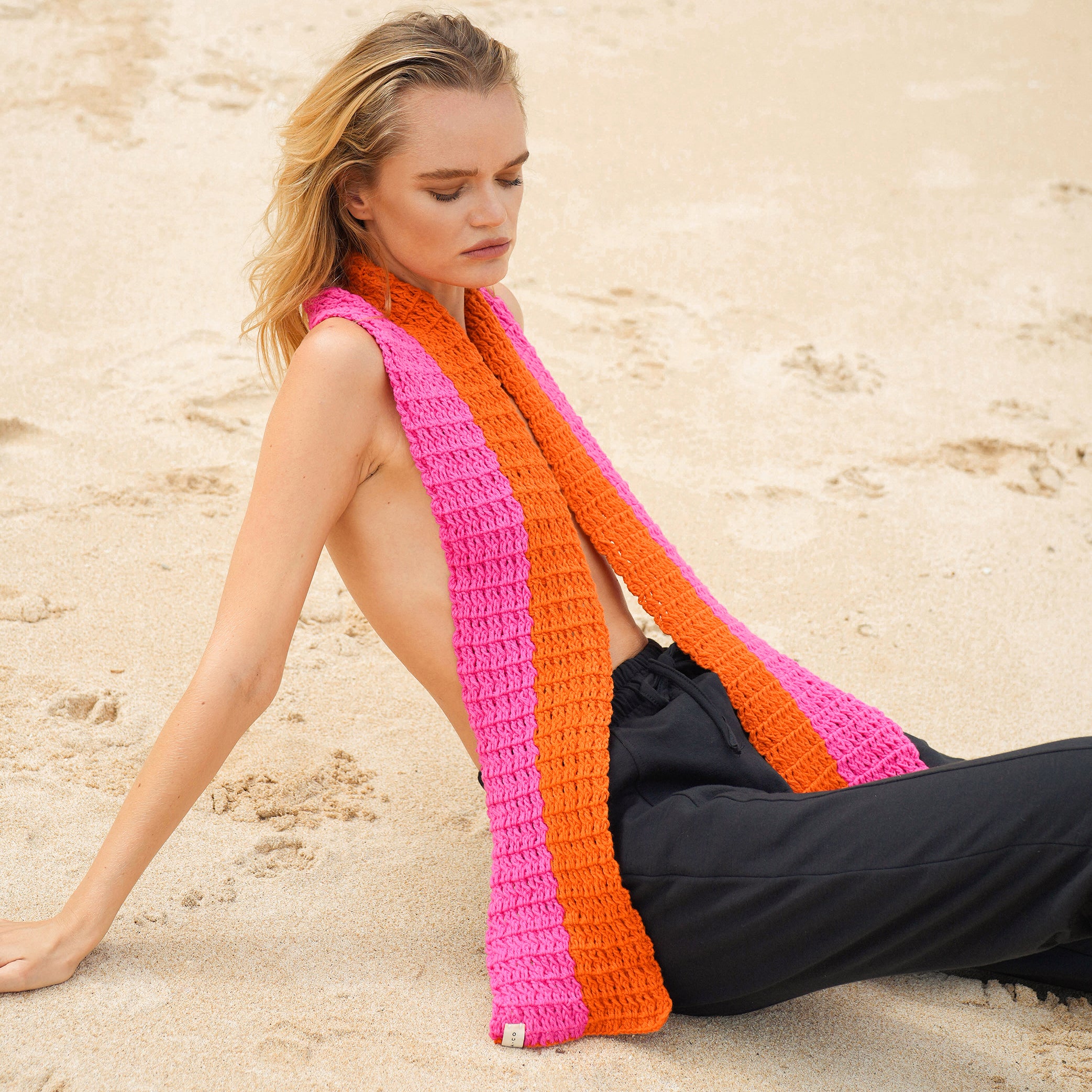 WAFFLE Crochet Scarf in vibrant Candy Pink and Tangerine Orange, showcasing a unique waffle pattern and soft cotton texture.