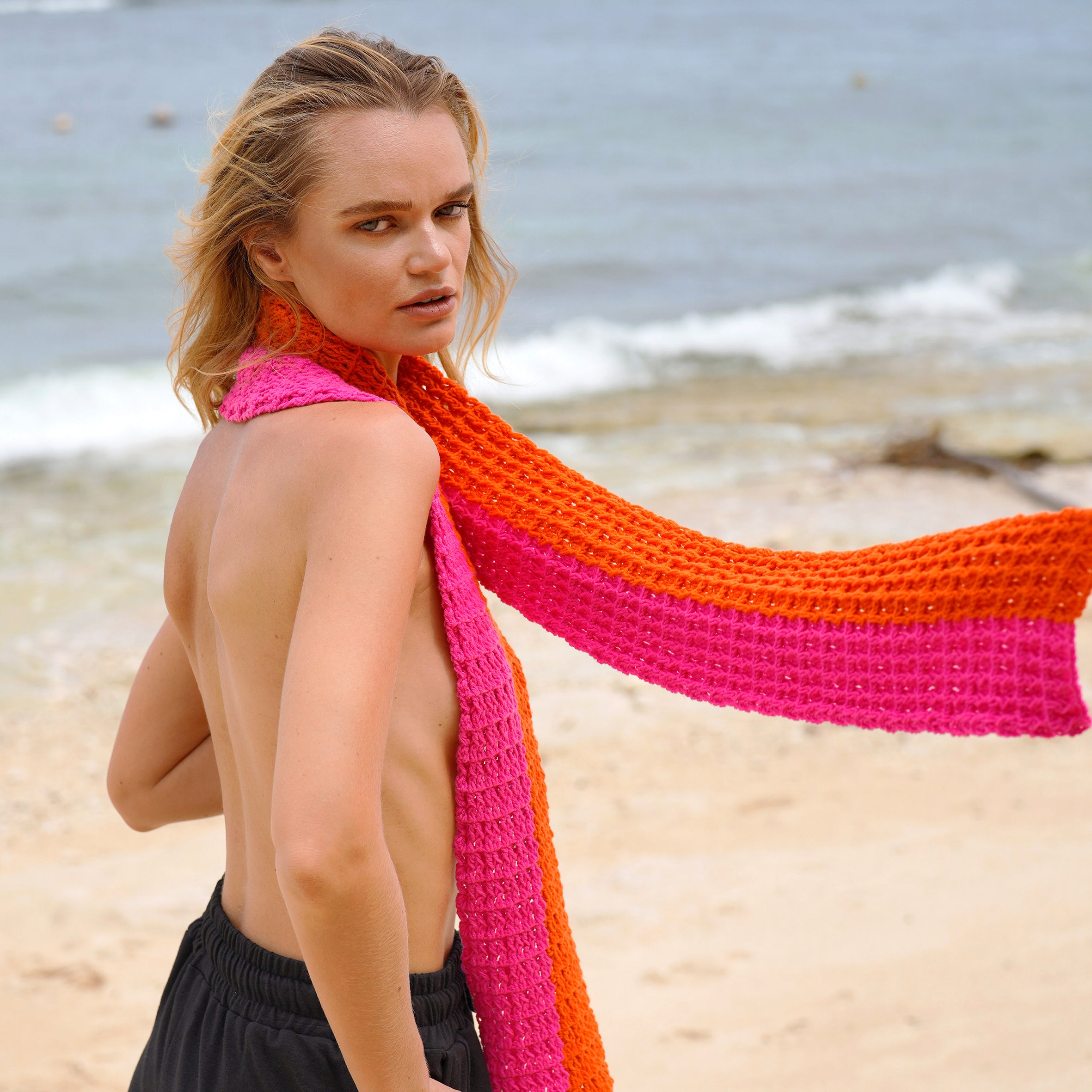 WAFFLE Crochet Scarf in vibrant Candy Pink and Tangerine Orange, showcasing a unique waffle pattern and soft cotton texture.