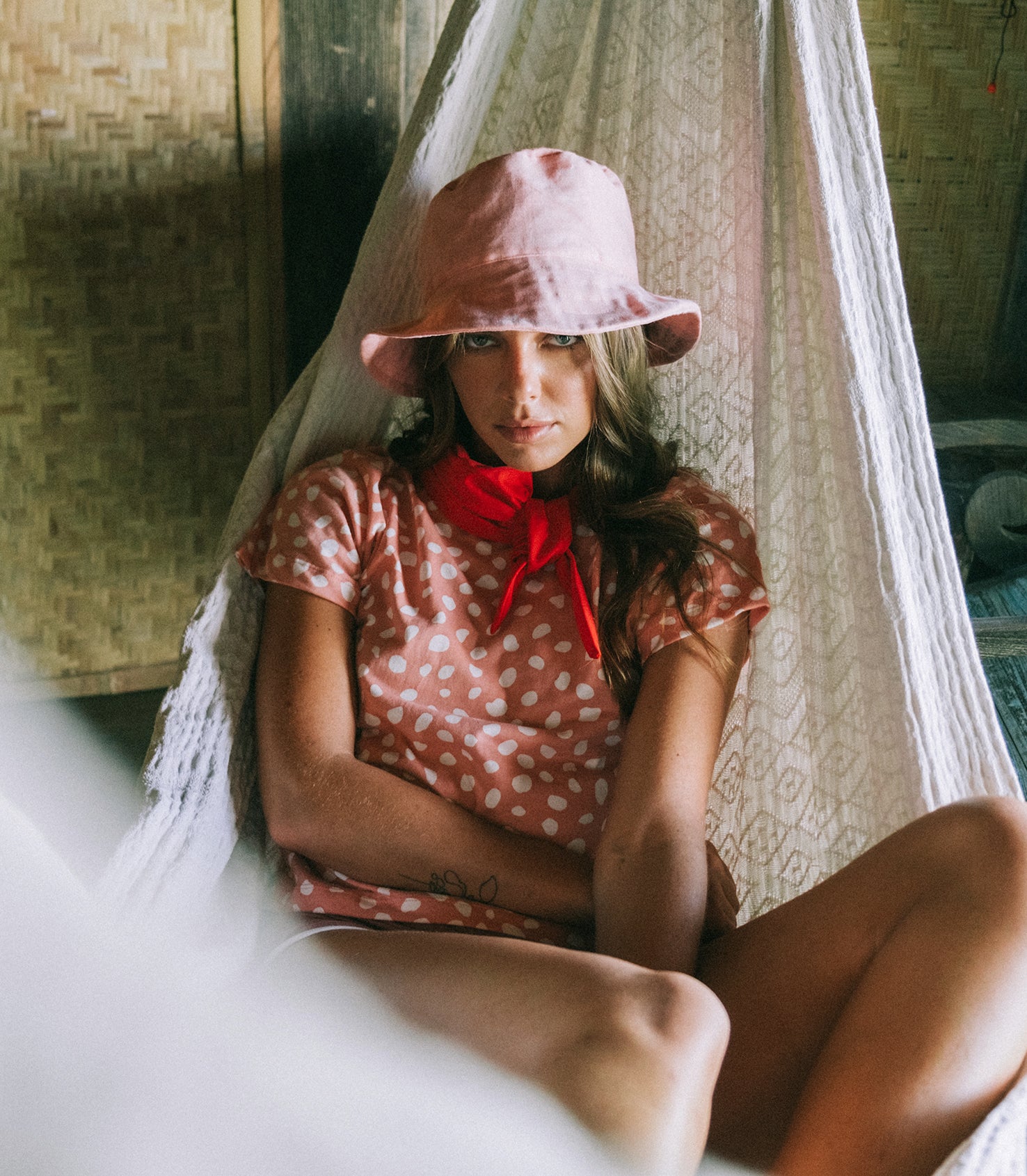 WATU Seaside Linen Bucket Hat in vibrant salt pink, showcasing its adjustable strap and breathable linen fabric.