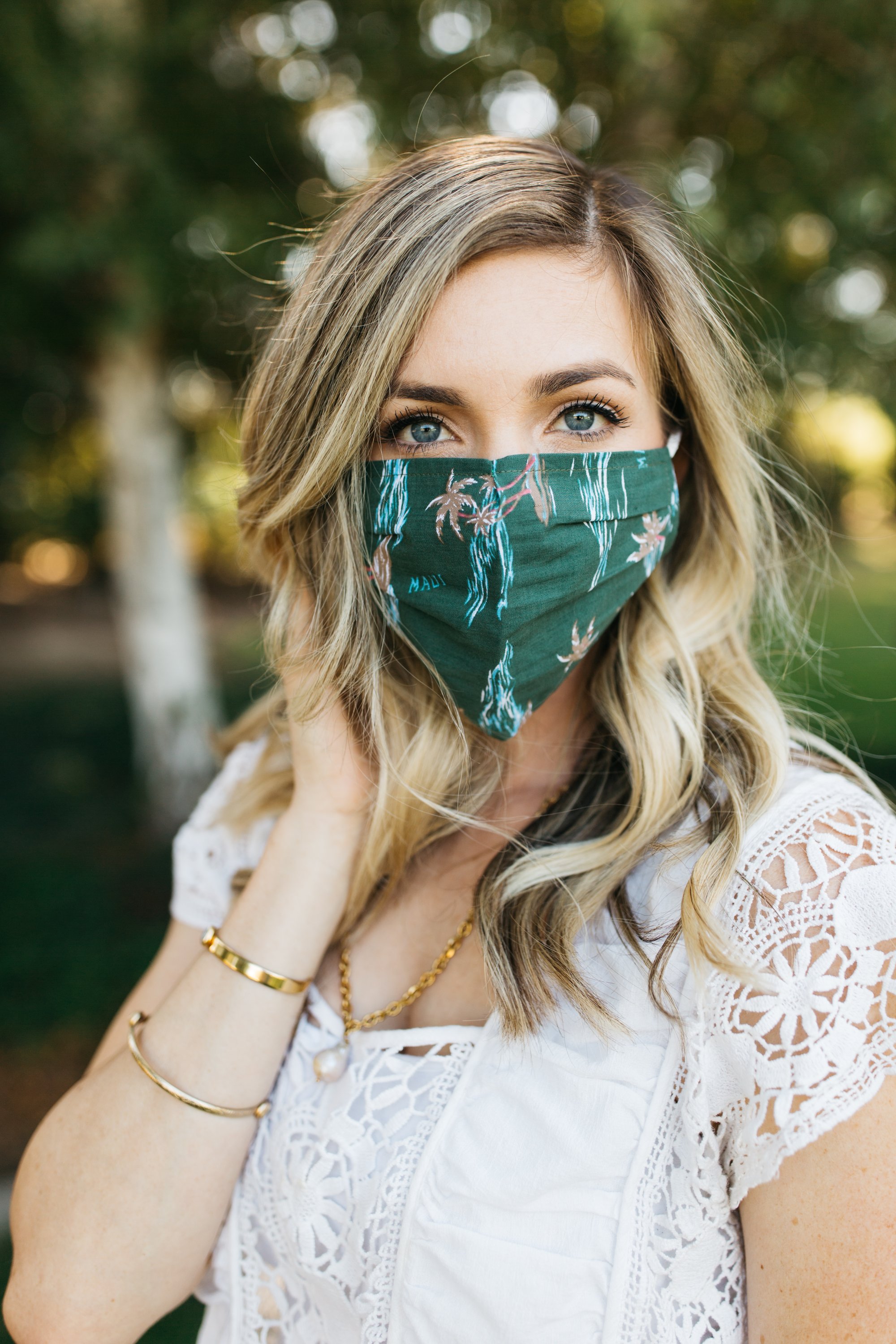 Waves Face Mask made of breathable cotton with stylish prints, featuring pleats for comfort and a pocket for filters.