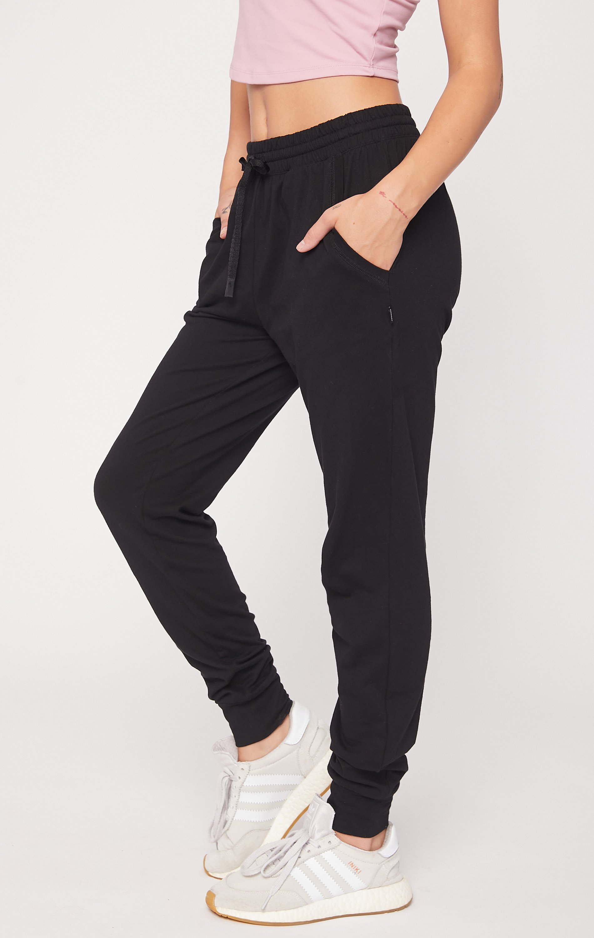 Black Weekend Jogger showcasing lightweight fabric and functional pockets, perfect for lounging and outdoor activities.