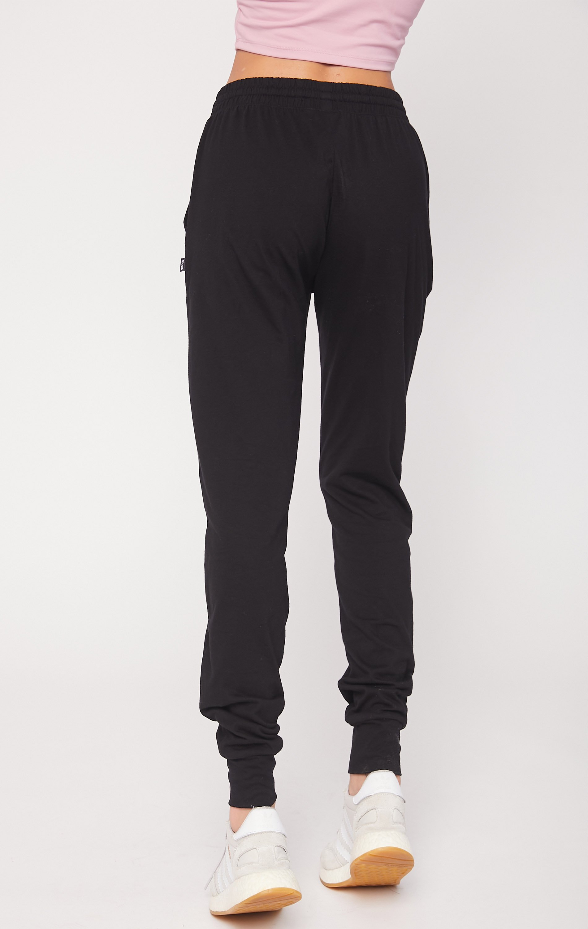 Black Weekend Jogger showcasing lightweight fabric and functional pockets, perfect for lounging and outdoor activities.