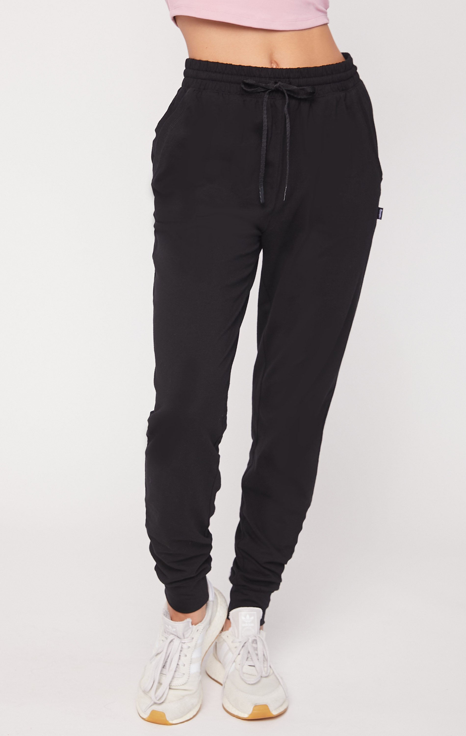 Black Weekend Jogger showcasing lightweight fabric and functional pockets, perfect for lounging and outdoor activities.