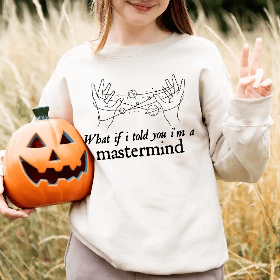 A stylish Halloween-themed T-shirt featuring the phrase 'What If I Told You I'm a Mastermind', made from soft ringspun cotton.