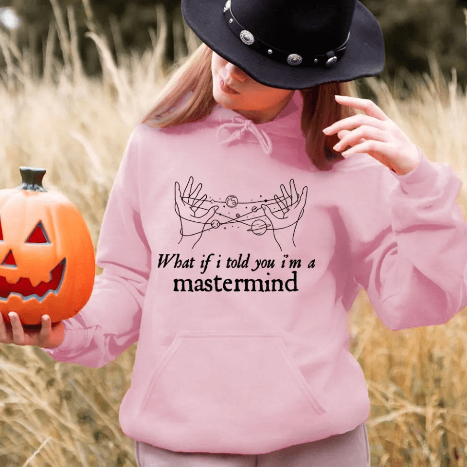 A stylish Halloween-themed T-shirt featuring the phrase 'What If I Told You I'm a Mastermind', made from soft ringspun cotton.