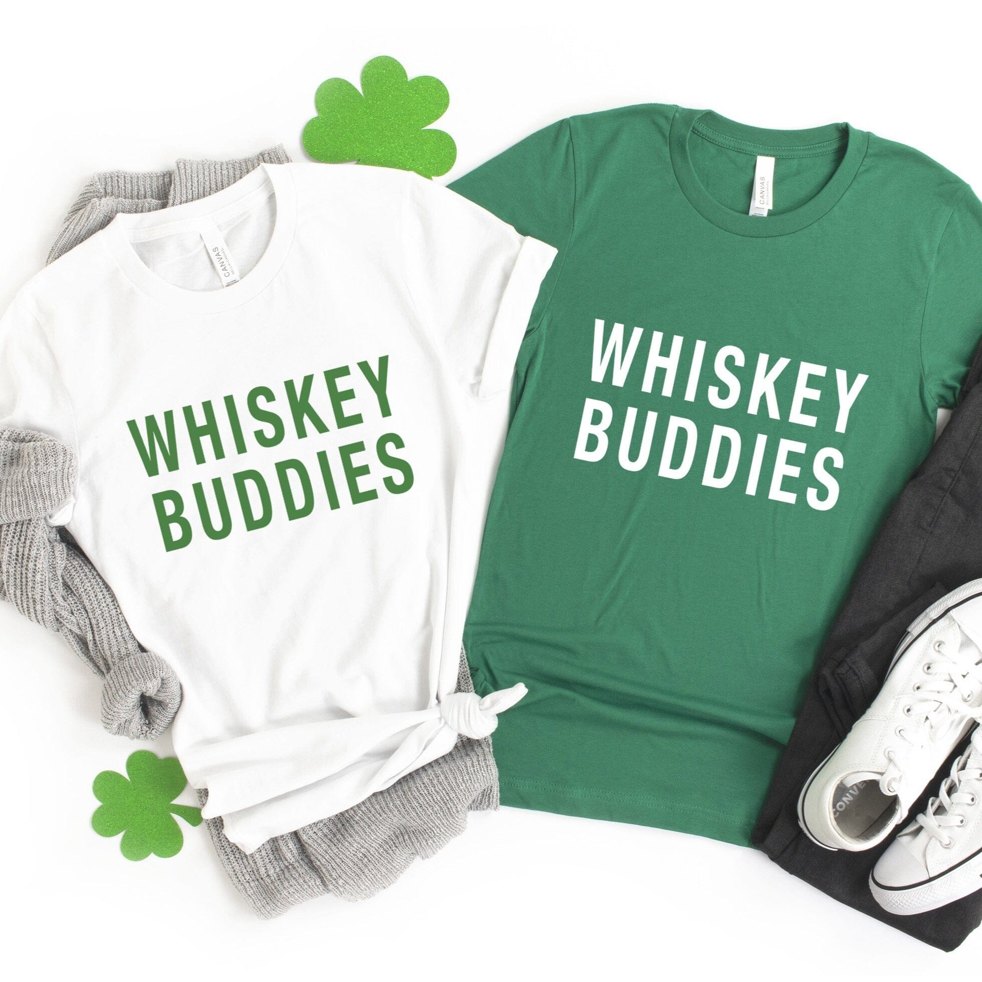 Whiskey Buddies Tee displayed on a mannequin, showcasing its comfortable fit and stylish design, perfect for casual wear.