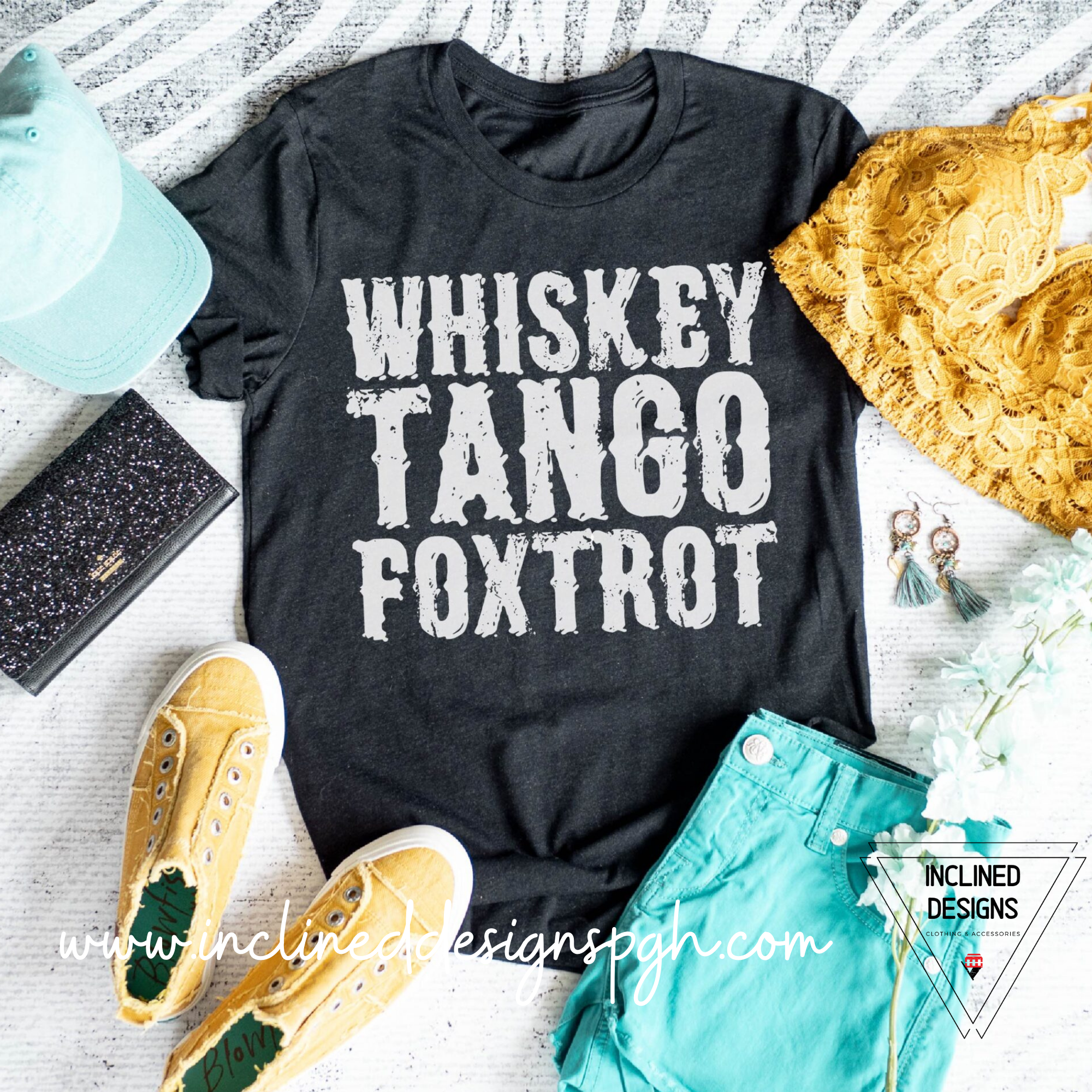 Whiskey Tango Foxtrot apparel featuring a stylish grey design on a tee, tank, and sweatshirt, showcasing comfort and versatility.