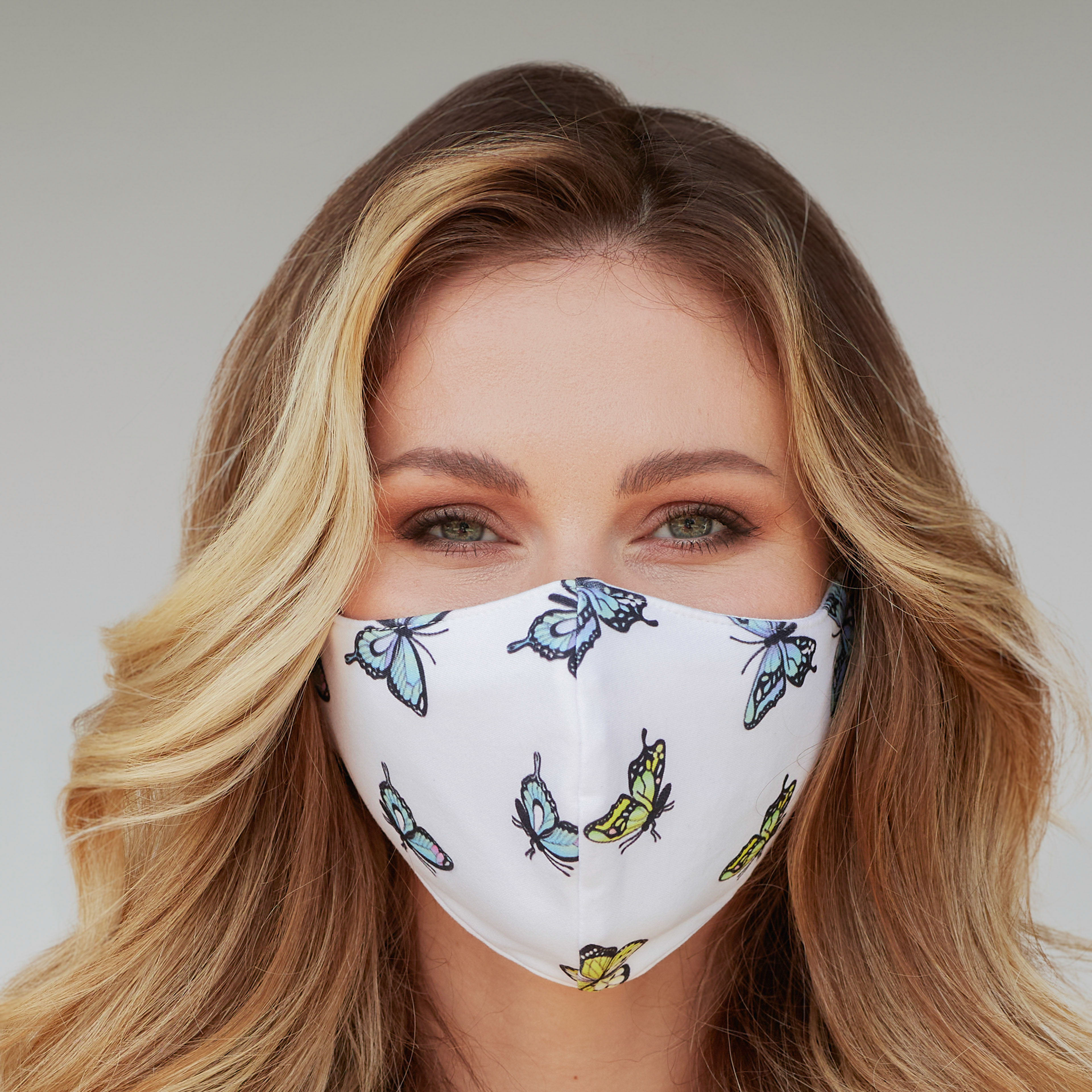 A stylish White Butterfly Face Mask featuring a unique butterfly design, perfect for protection and fashion.