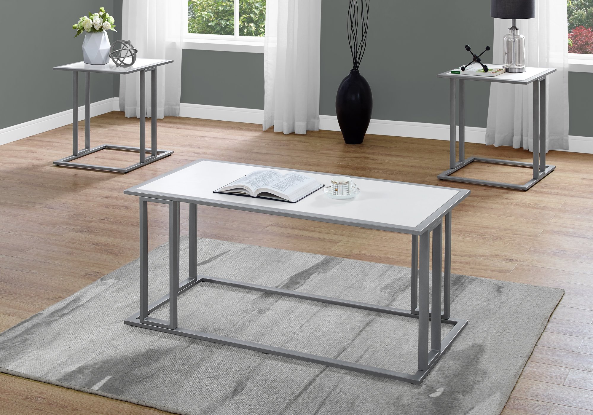 Elegant White Silver Metal Table Set featuring three stylish tables, perfect for enhancing living room decor.