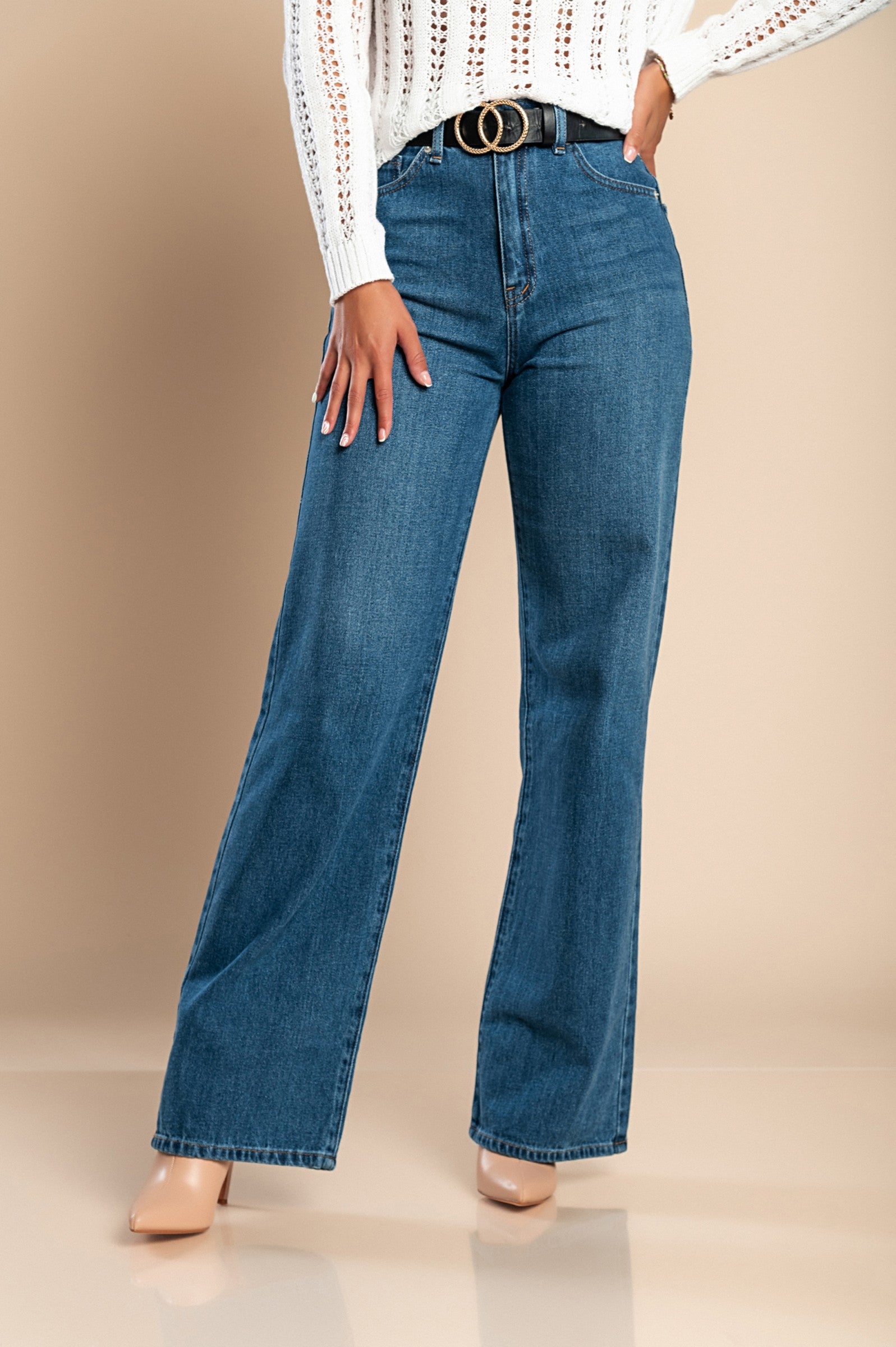 A pair of stylish blue wide-leg jeans featuring a high waist, front and back pockets, and a zip and button closure.