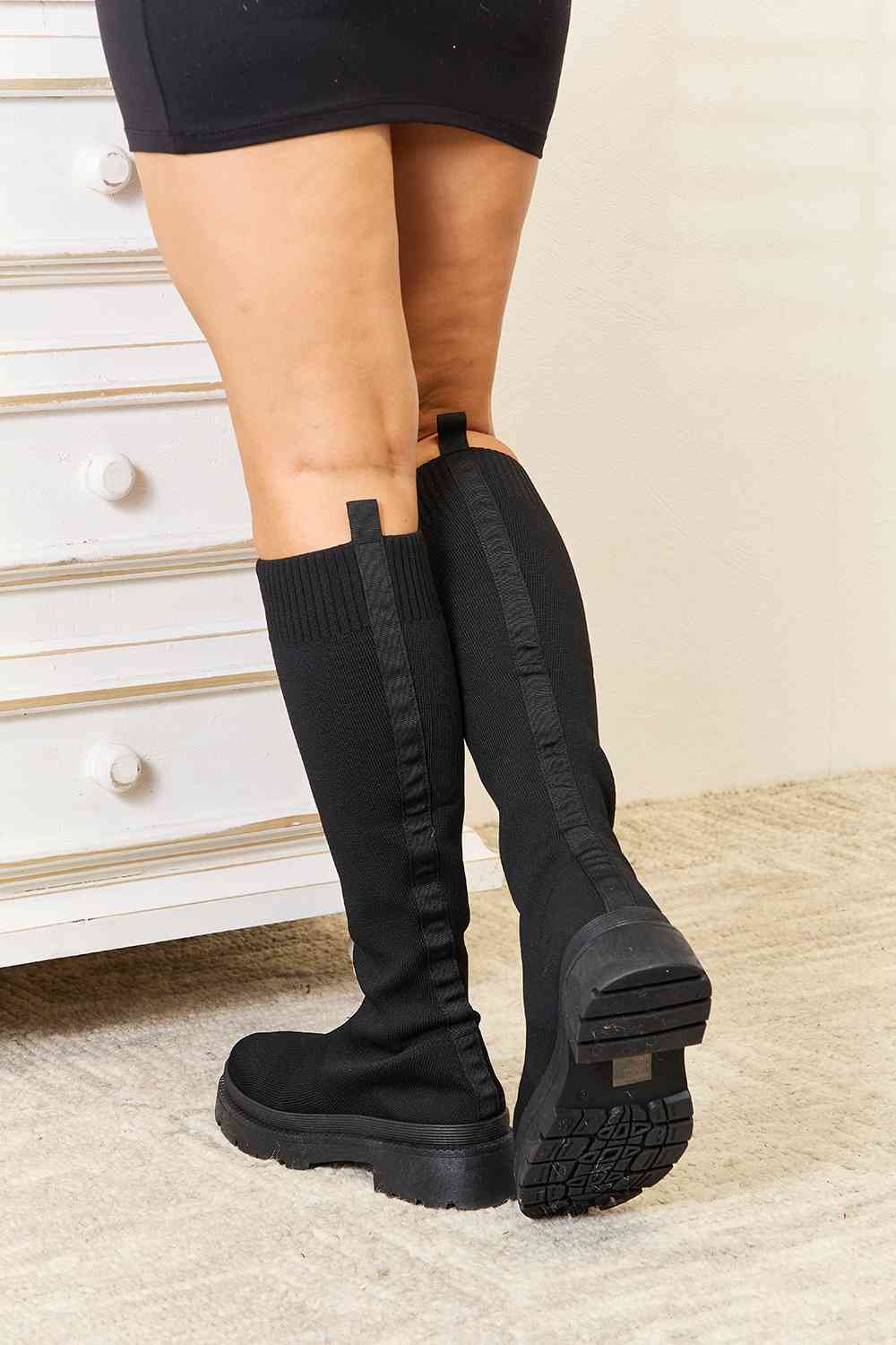 WILD DIVA Knee High Platform Sock Boots showcasing a sleek design with a snug fit and stylish platform sole.