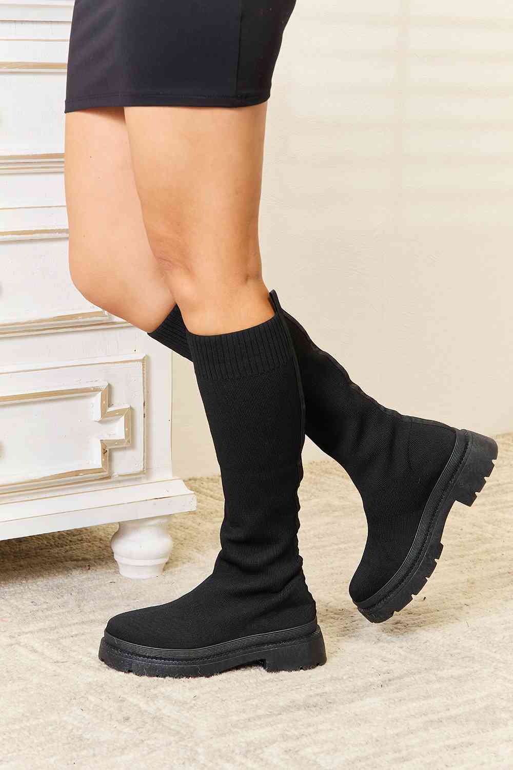 WILD DIVA Knee High Platform Sock Boots showcasing a sleek design with a snug fit and stylish platform sole.