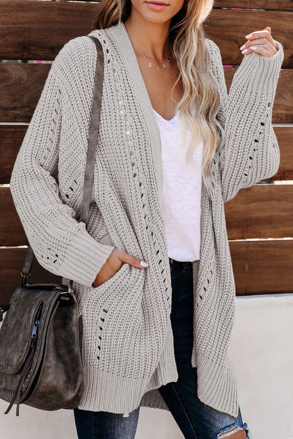 Wine Drop Sleeve Cable Knit Cardigan with Slits, featuring a classic cable knit design, open front, long sleeves, and side pockets in a rich wine color.