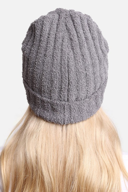 A cozy Winter Solid Color Ribbed Cuff Beanie Hat in a solid color, featuring a stylish ribbed cuff design, perfect for winter wear.