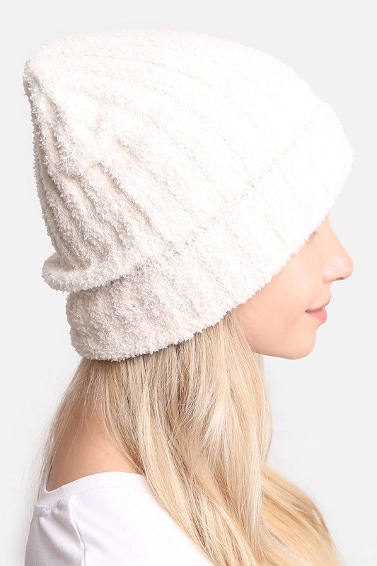 A cozy Winter Solid Color Ribbed Cuff Beanie Hat in a solid color, featuring a stylish ribbed cuff design, perfect for winter wear.