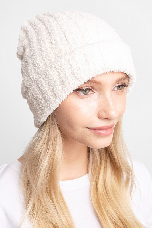 A cozy Winter Solid Color Ribbed Cuff Beanie Hat in a solid color, featuring a stylish ribbed cuff design, perfect for winter wear.