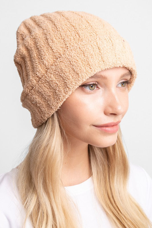 A cozy Winter Solid Color Ribbed Cuff Beanie Hat in a solid color, featuring a stylish ribbed cuff design, perfect for winter wear.