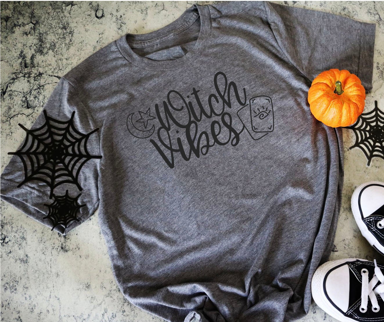 Witch Vibes Adult Tee or Tank featuring a stylish black design, perfect for casual wear.