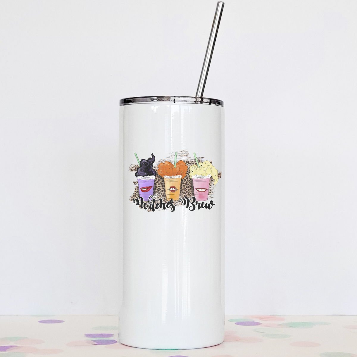 Witches Brew Tumbler with clear slider lid and stainless steel straw, showcasing its stylish design and double-walled stainless steel construction.