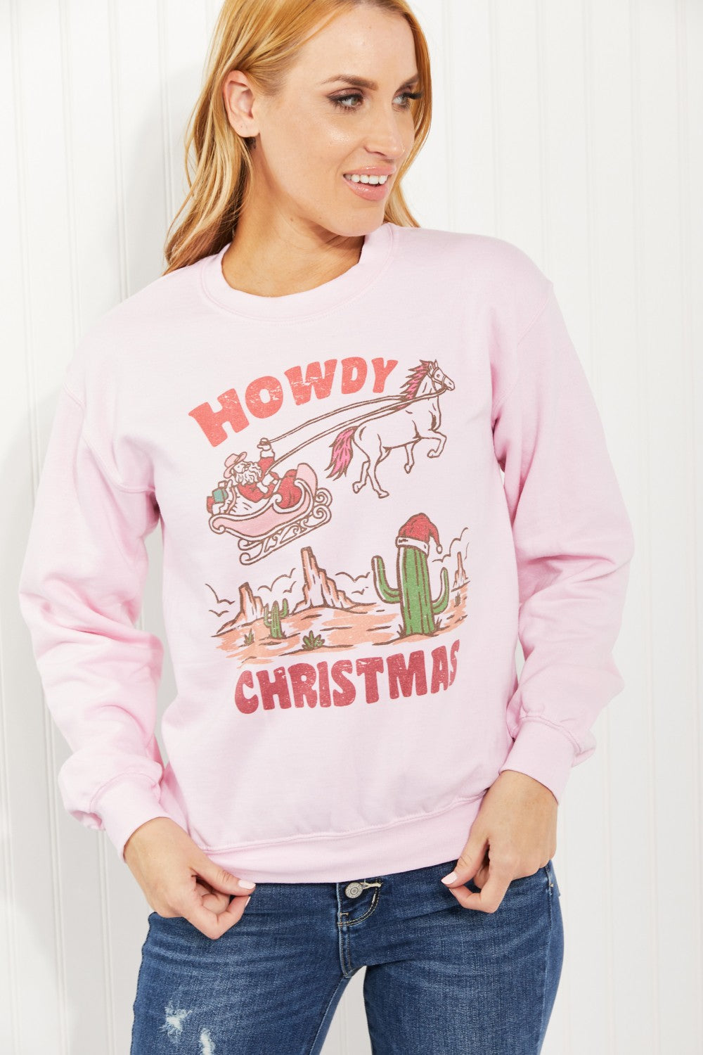 WKNDER Howdy Christmas Full Size Graphic Sweatshirt featuring a festive design with a round neck and long sleeves.