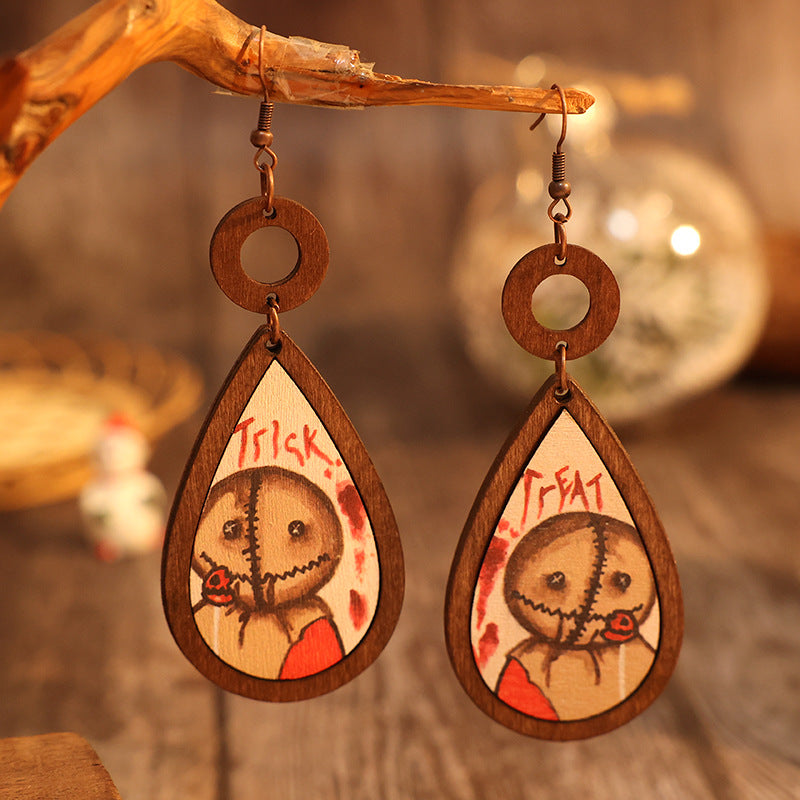 A pair of elegant wooden teardrop shape earrings made from alloy and wood, showcasing a natural and stylish design.