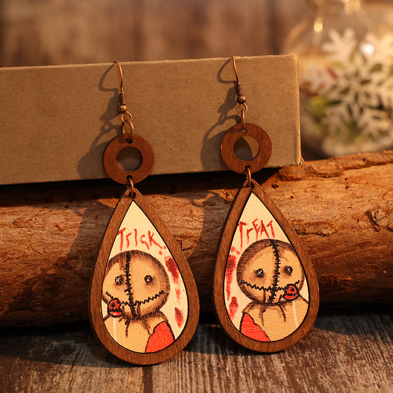 A pair of elegant wooden teardrop shape earrings made from alloy and wood, showcasing a natural and stylish design.