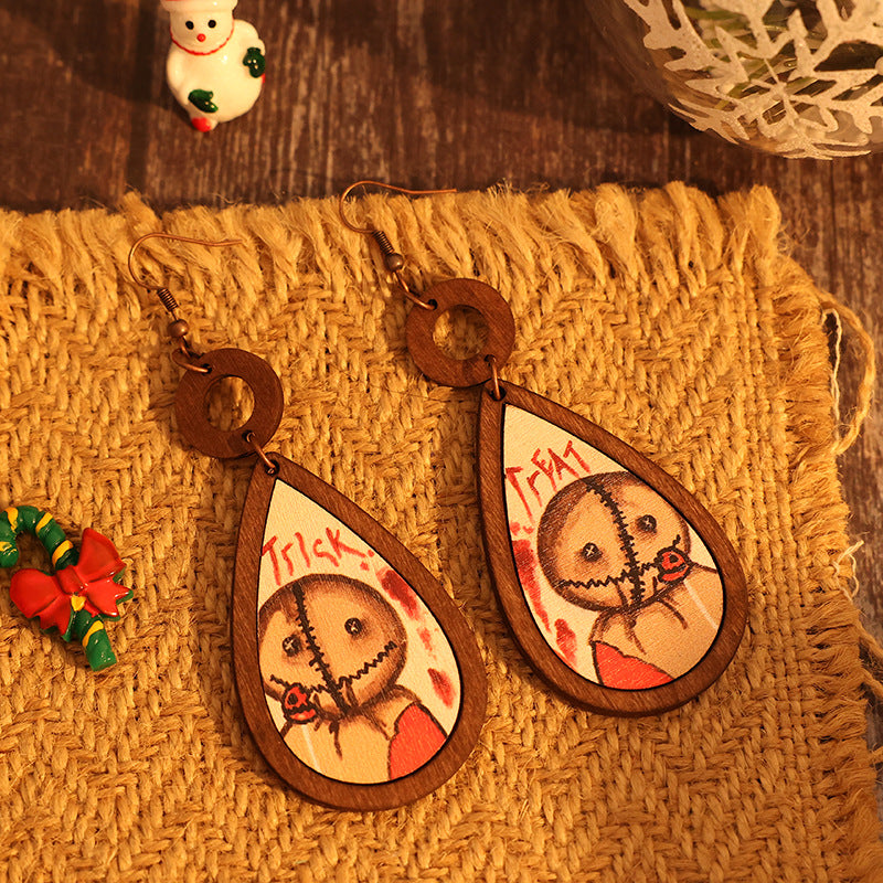 A pair of elegant wooden teardrop shape earrings made from alloy and wood, showcasing a natural and stylish design.