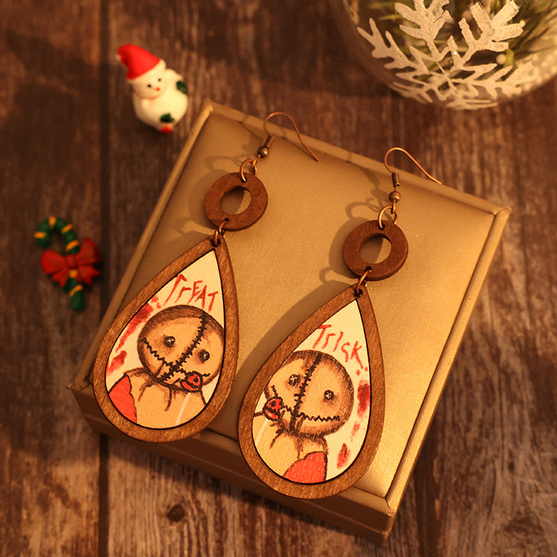 A pair of elegant wooden teardrop shape earrings made from alloy and wood, showcasing a natural and stylish design.