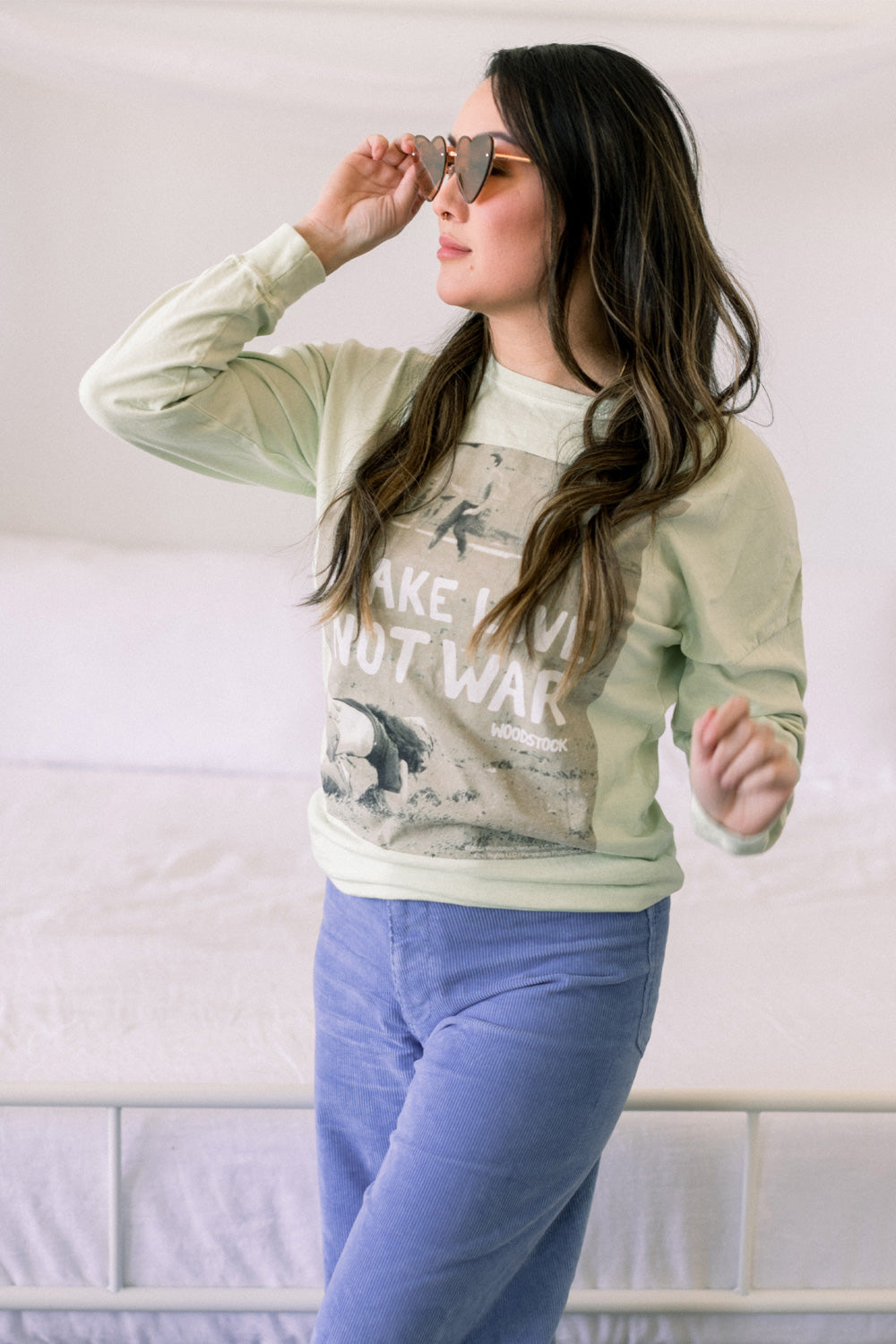 Woodstock Lover Long Sleeve shirt in Mint and Ivory colors, featuring a bold print with a message of love and peace.